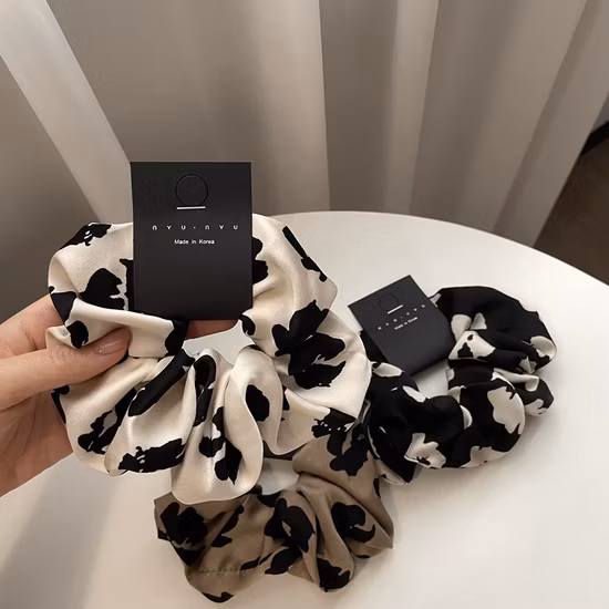 Nouvelle lumière luxe mode haut de gamme fleur gros intestin anneau de cheveux simple tempérament tout match cheveux corde cheveux accessoires femmes